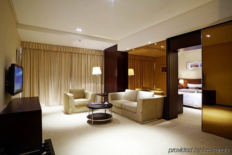 Jiazheng International Energy Hotel Huaqiao  Стая снимка
