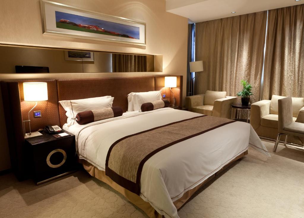 Jiazheng International Energy Hotel Huaqiao  Стая снимка